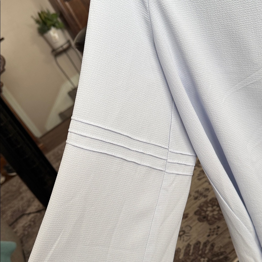 Elegant Light Blue Smocked Neck Blouse - Picture 6 of 15